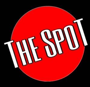 A logo of the spot in red and white and black